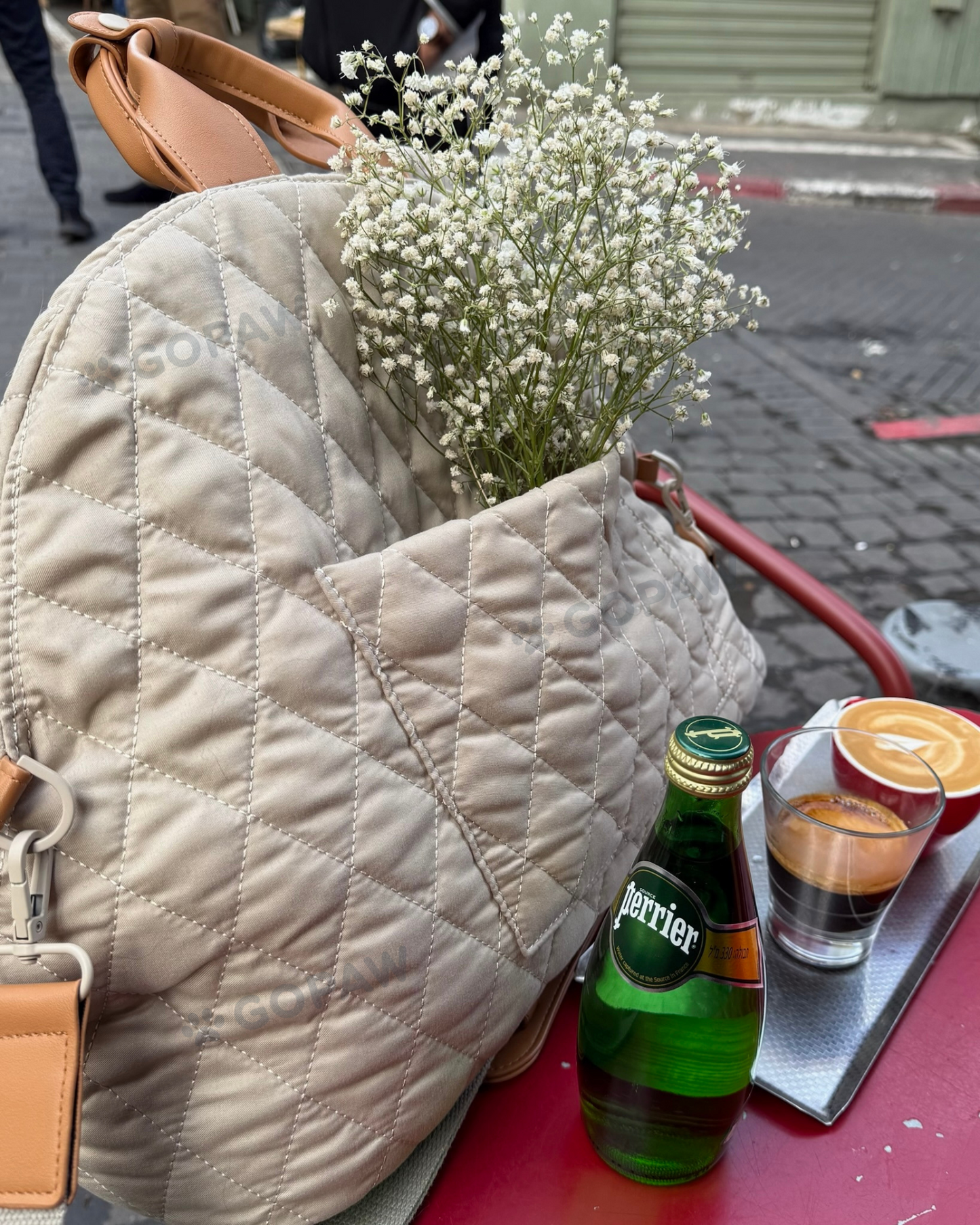 Luci Carrier Handbag